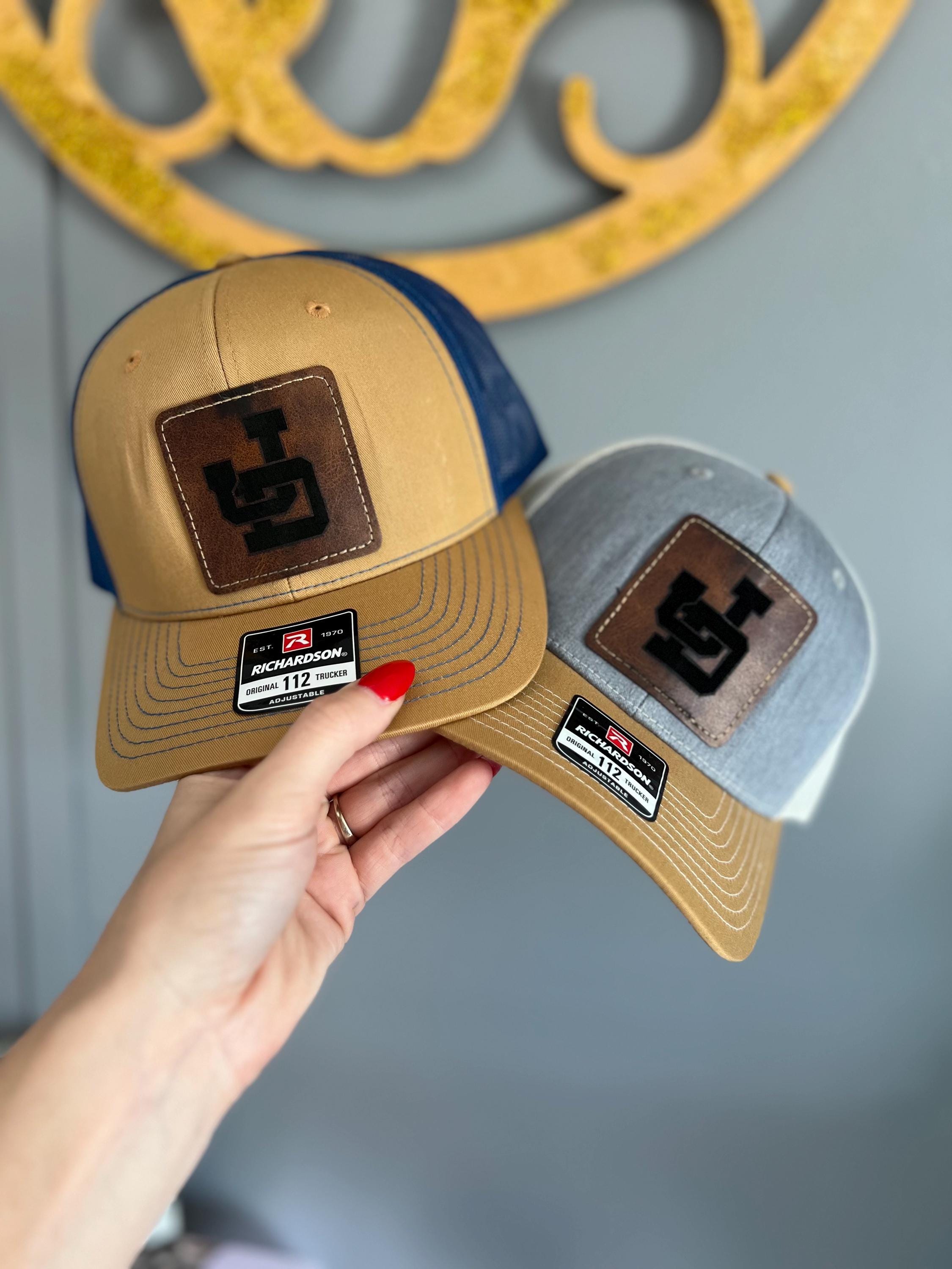 personalized Richardson snap back hats with logo engraved on the leather patches