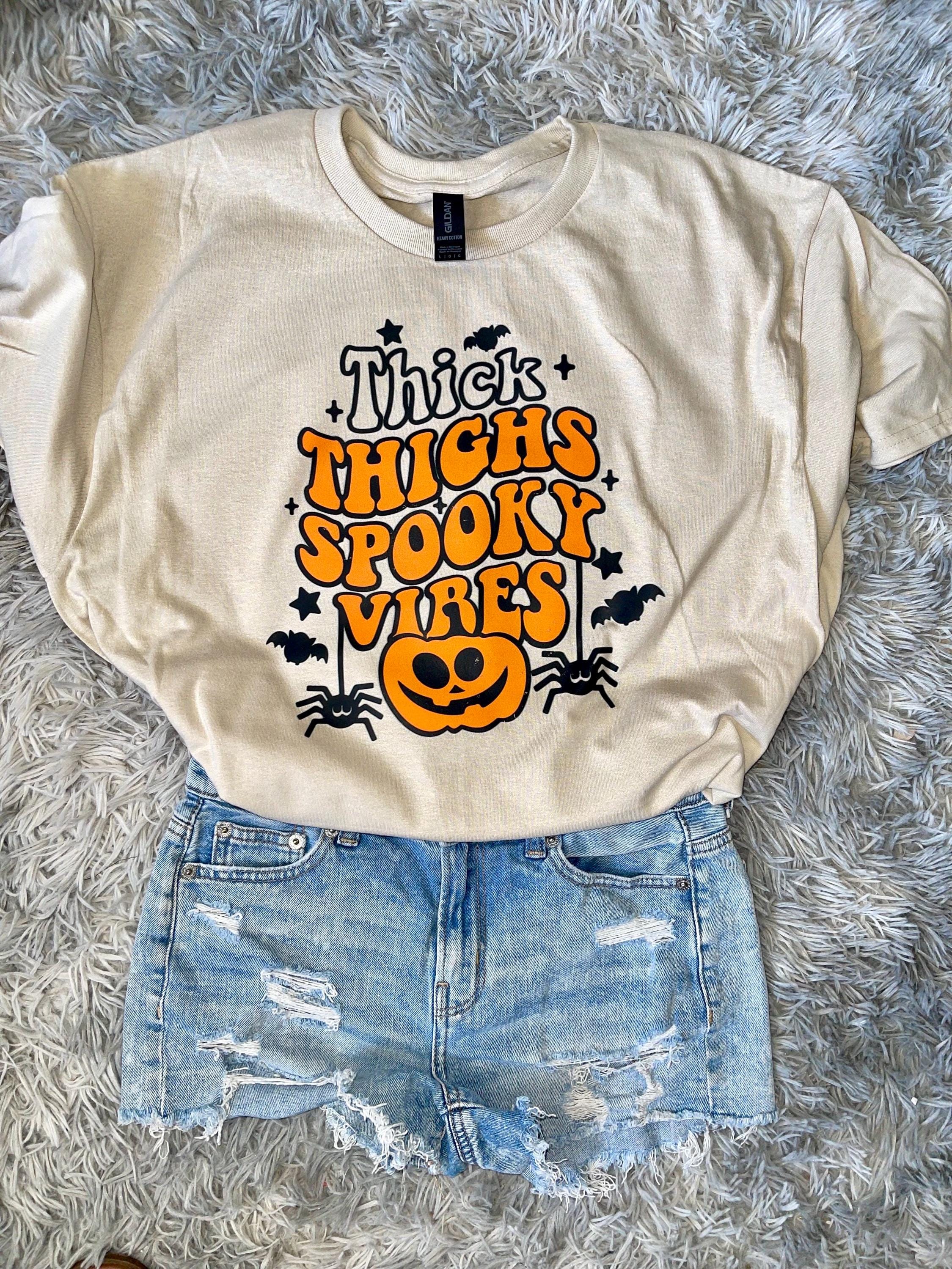 Thick thighs spooky vibes graphic t shirt Halloween t shirt spooky vibes t shirt graphic